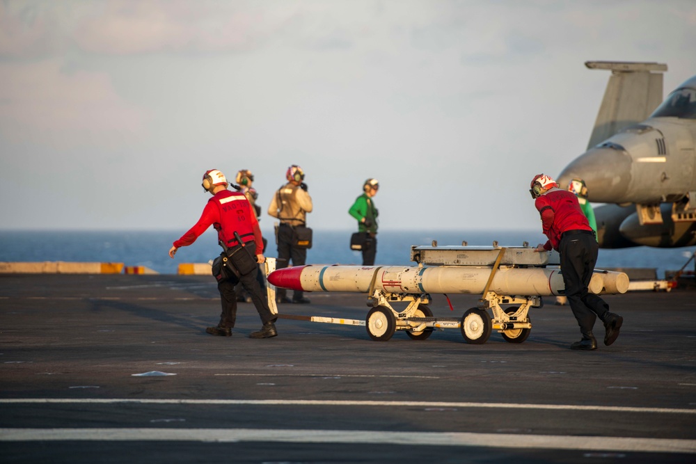 U.S. Navy Sailors Move Ordnance