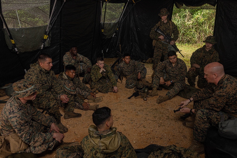 Combat Logistics Battalion 4 Marines participate in an M9 pistol class during MCCRE