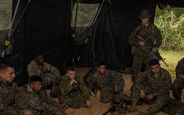 Combat Logistics Battalion 4 Marines participate in an M9 pistol class during MCCRE