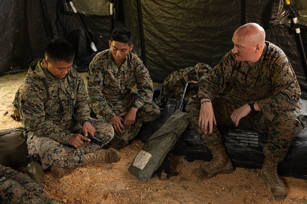 Combat Logistics Battalion 4 Marines participate in an M9 pistol class during MCCRE