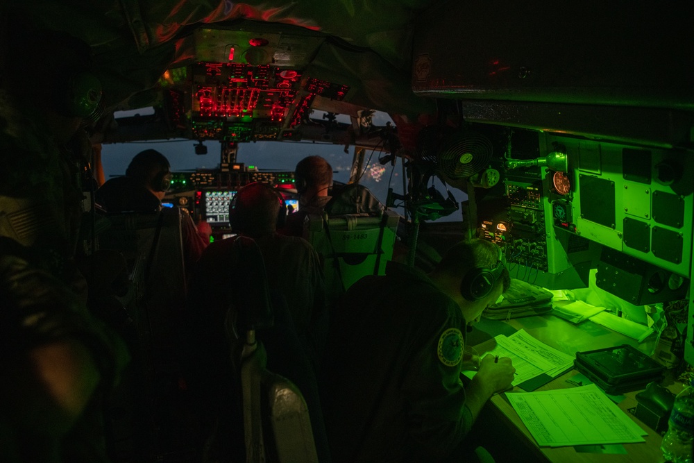 Airmen piloting and navigating a KC-135 Stratotanker