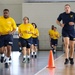 Recruits run in Freedom Hall at Recruit Training Command