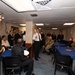 U.S Pacific Fleet Commander Adm. Samuel Paparo speaks with USS Mobile (LCS 26) Sailors during IMDEX 2023