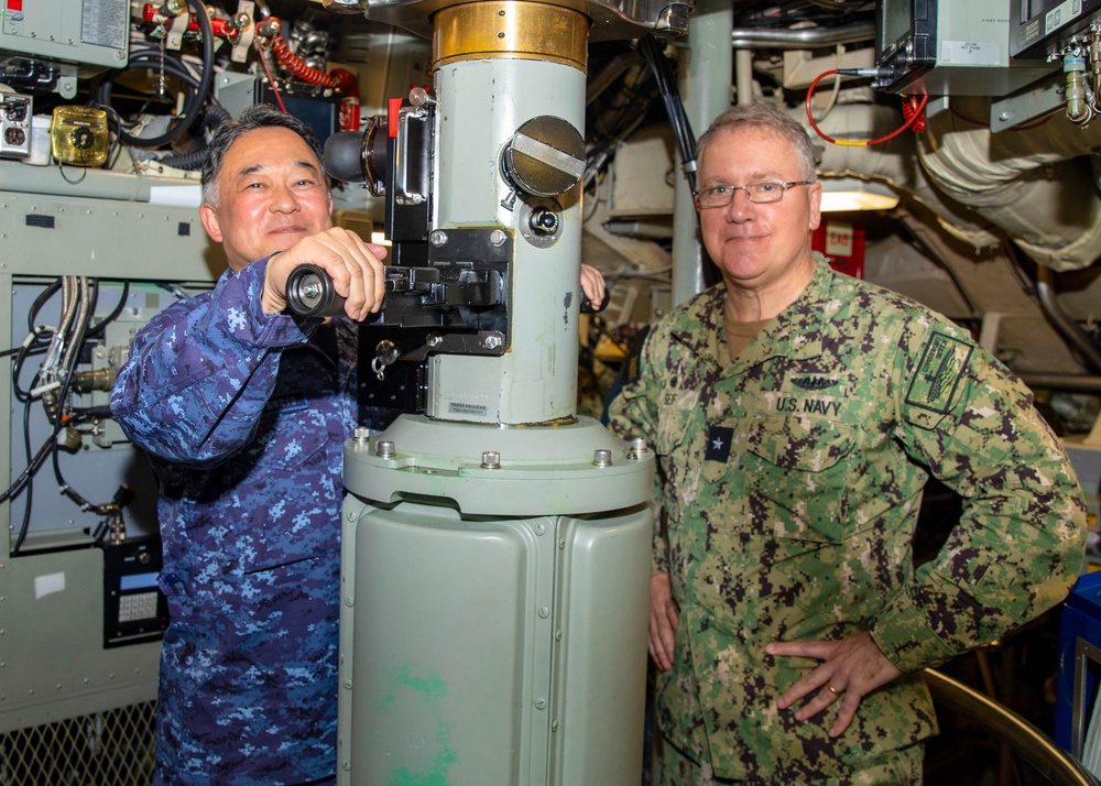 Distinguished visitors spend time at sea aboard the Ohio-class ballistic missile submarine USS Maine (SSBN 741).