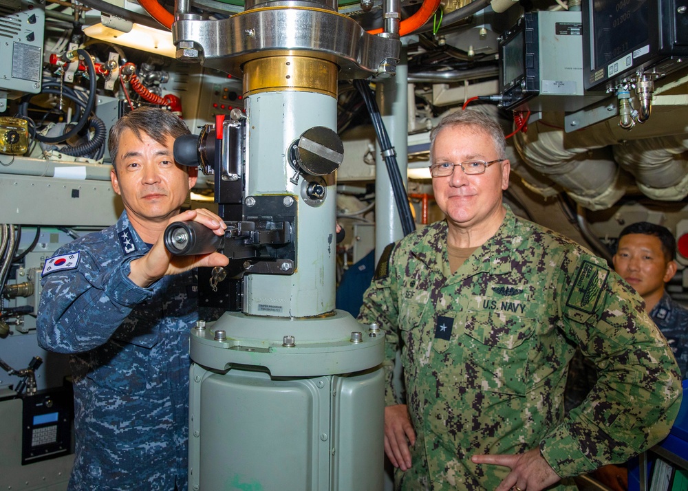 Distinguished visitors spend time at sea aboard the Ohio-class ballistic missile submarine USS Maine (SSBN 741).