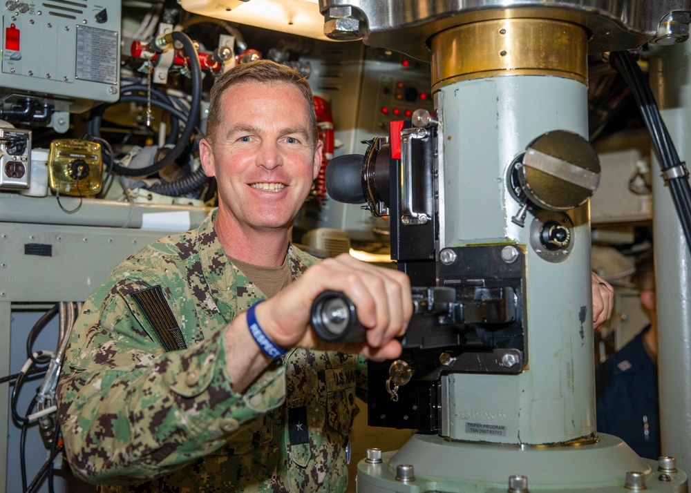 Distinguished visitors spend time at sea aboard the Ohio-class ballistic missile submarine USS Maine (SSBN 741).