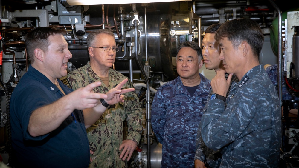 Distinguished visitors spend time at sea aboard the Ohio-class ballistic missile submarine USS Maine (SSBN 741).
