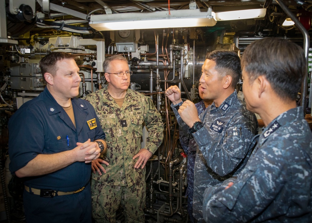 Distinguished visitors spend time at sea aboard the Ohio-class ballistic missile submarine USS Maine (SSBN 741).