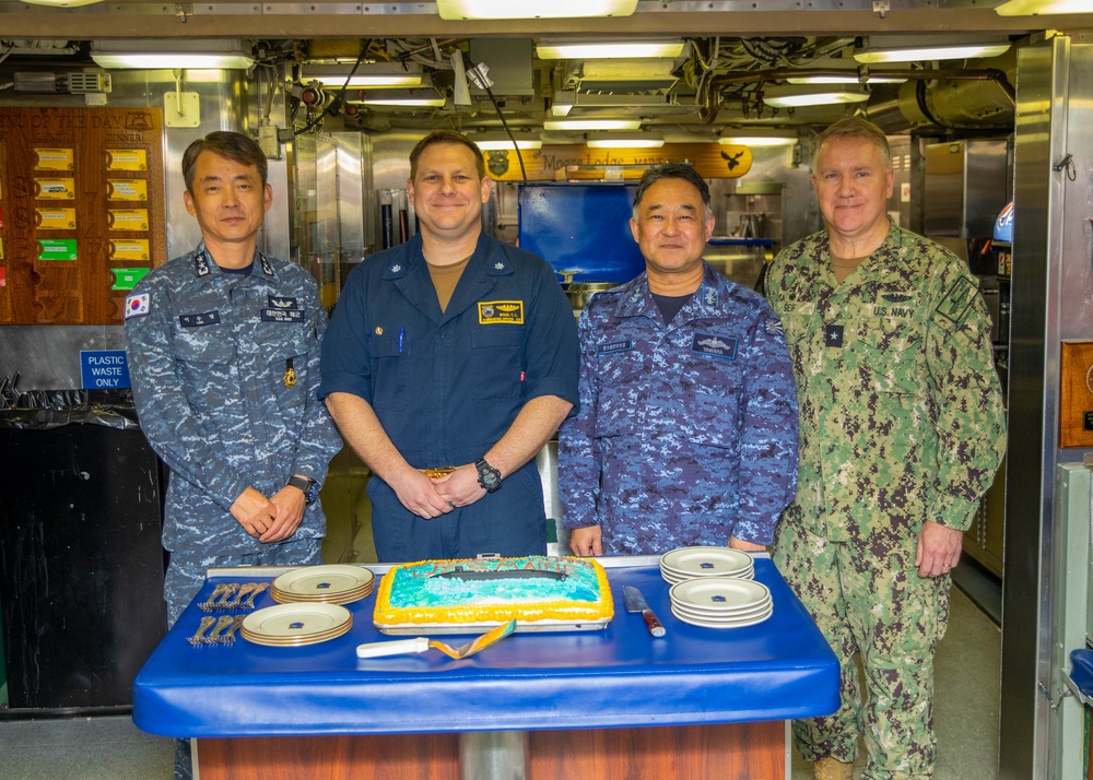 Distinguished visitors spend time at sea aboard the Ohio-class ballistic missile submarine USS Maine (SSBN 741).