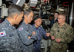 Distinguished visitors spend time at sea aboard the Ohio-class ballistic missile submarine USS Maine (SSBN 741).