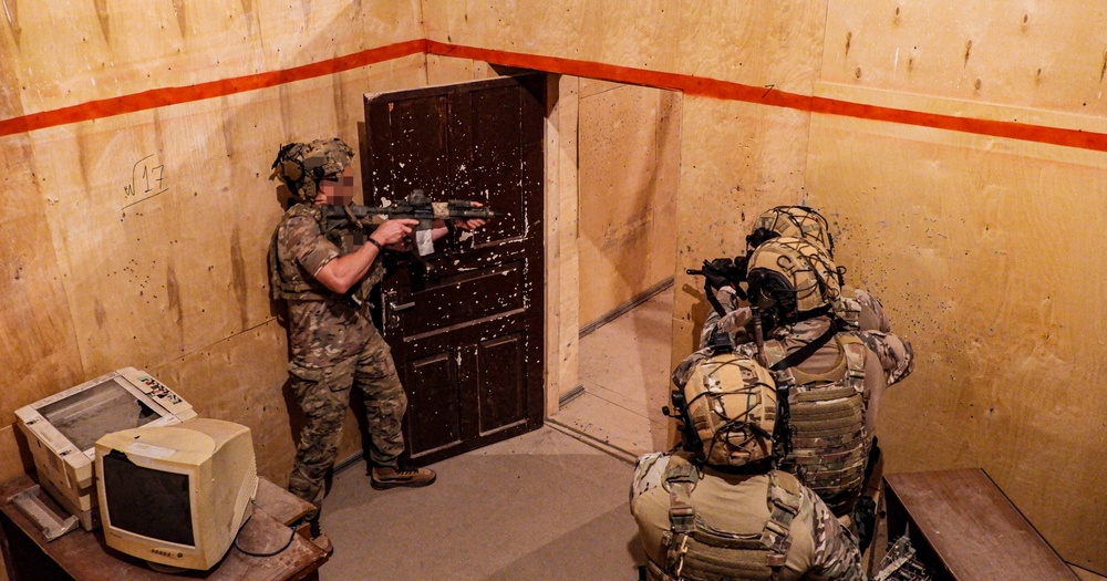 U.S. Army Special Forces Operators perform close-quarters battle drills alongside Georgian SOF partners