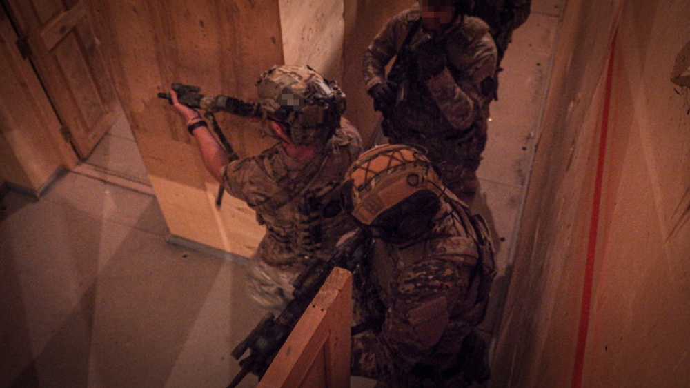 U.S. Army Special Forces Operators perform close-quarters battle drills alongside Georgian SOF partners