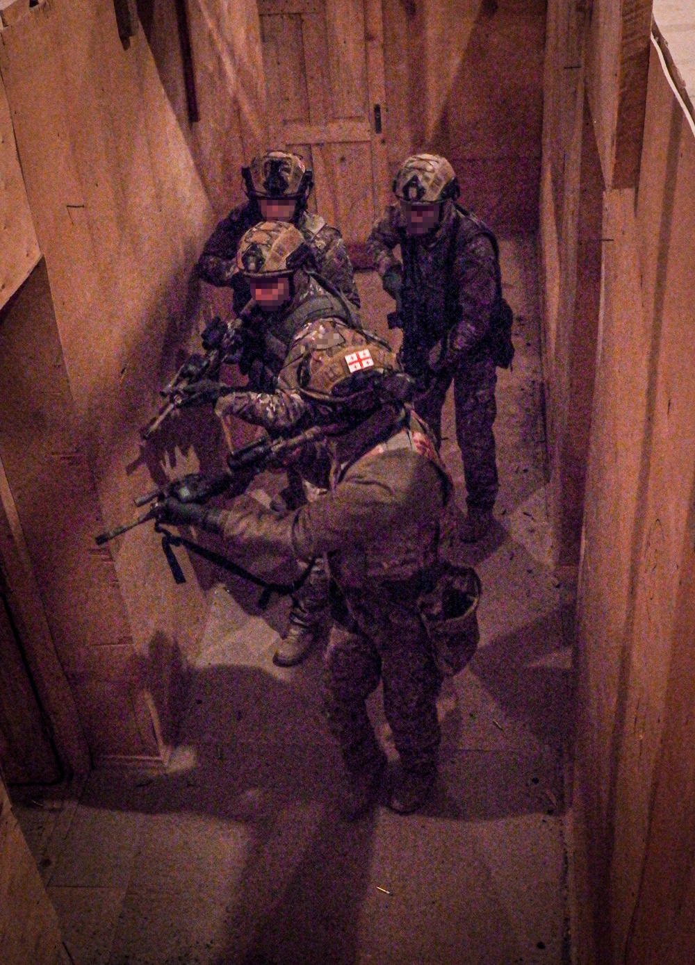 U.S. Army Special Forces Operators perform close-quarters battle drills alongside Georgian SOF partners