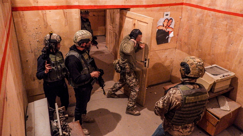 U.S. Army Special Forces Operators perform close-quarters battle drills alongside Georgian SOF partners