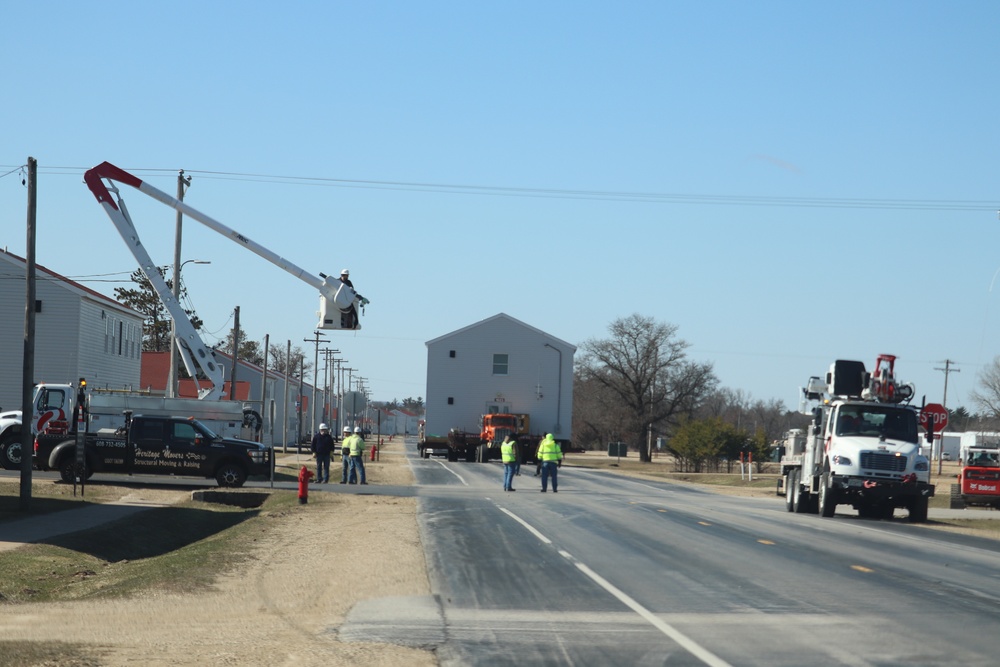 Contractors move fourth World War II-era barracks to new location in April 2023