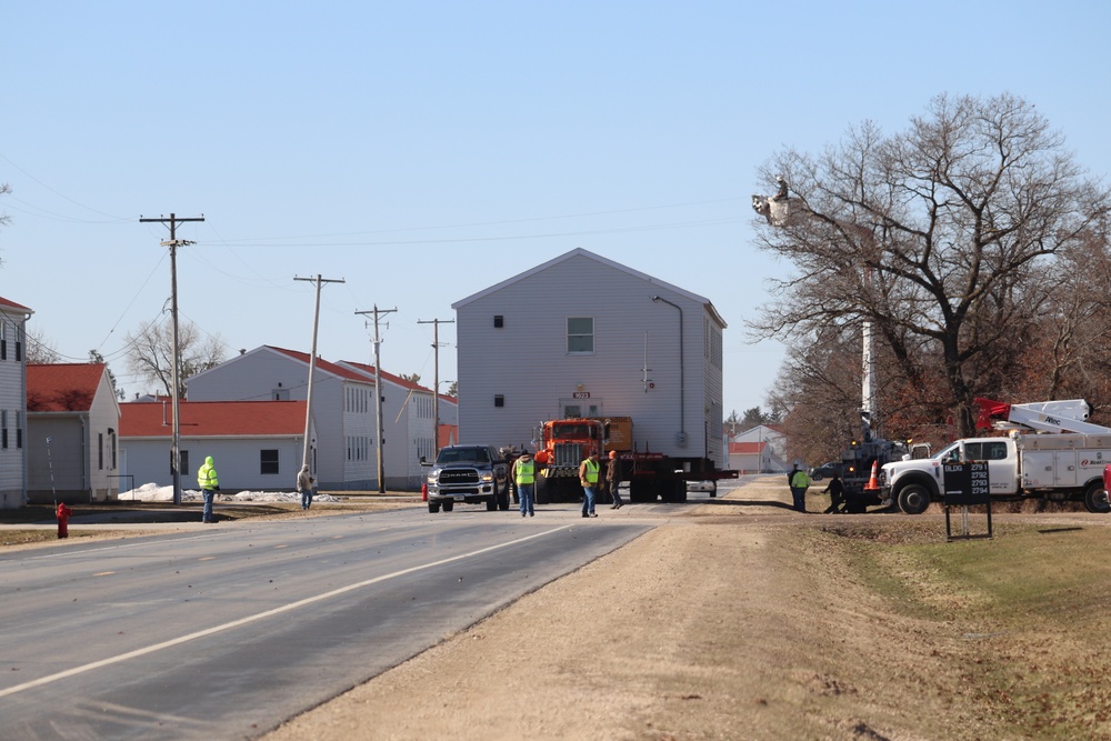 Contractors move fourth World War II-era barracks to new location in April 2023