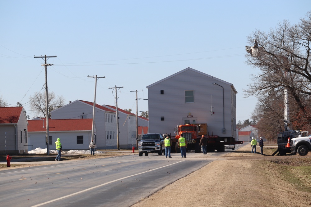 Contractors move fourth World War II-era barracks to new location in April 2023