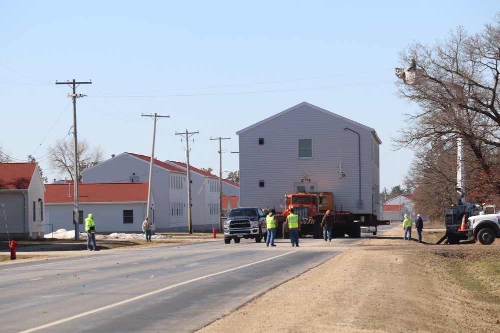 Contractors move fourth World War II-era barracks to new location in April 2023