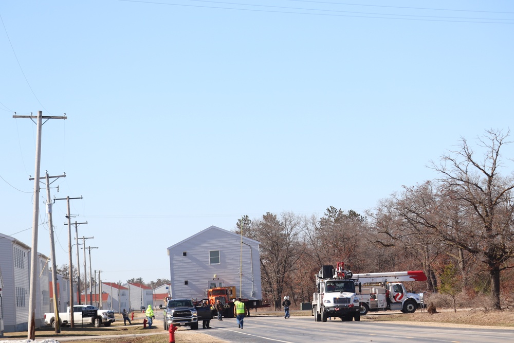 Contractors move fourth World War II-era barracks to new location in April 2023