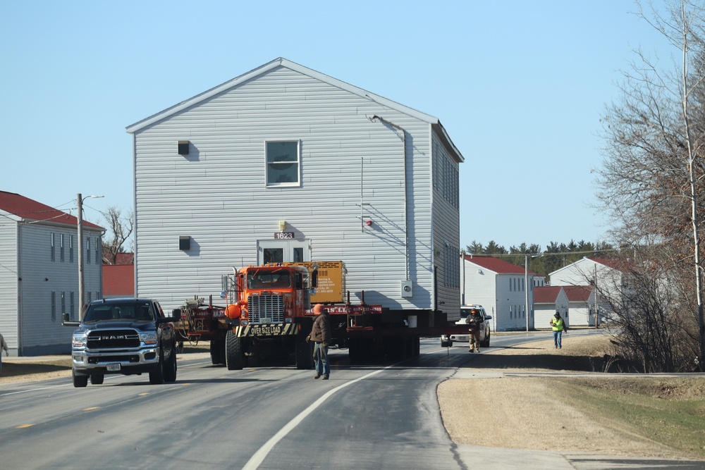 Contractors move fourth World War II-era barracks to new location in April 2023