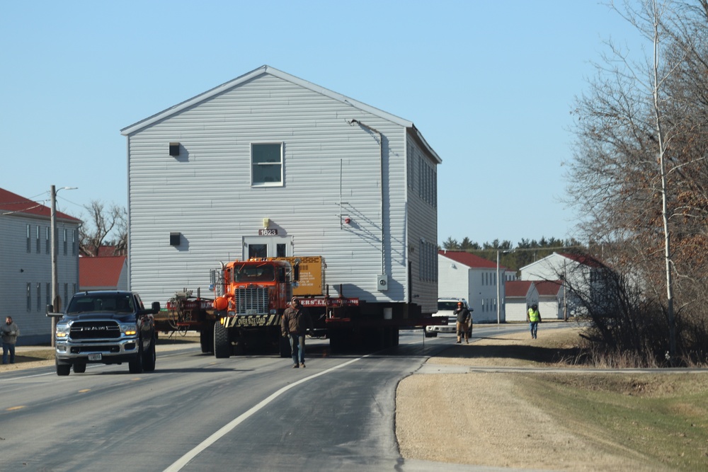 Contractors move fourth World War II-era barracks to new location in April 2023