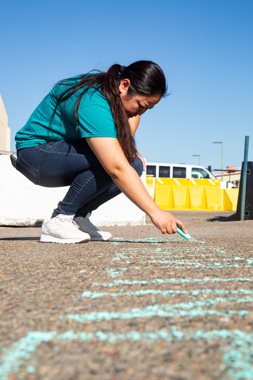 USS Abraham Lincoln SAPR VA team members promote sexual assault awareness