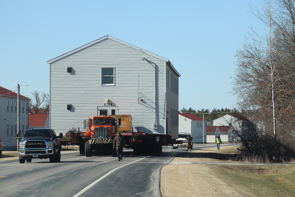 Contractors move fourth World War II-era barracks to new location in April 2023