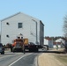 Contractors move fourth World War II-era barracks to new location in April 2023