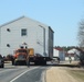 Contractors move fourth World War II-era barracks to new location in April 2023