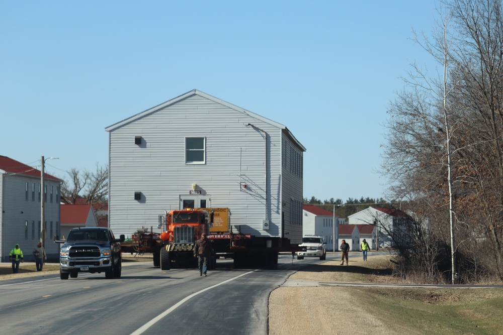 Contractors move fourth World War II-era barracks to new location in April 2023