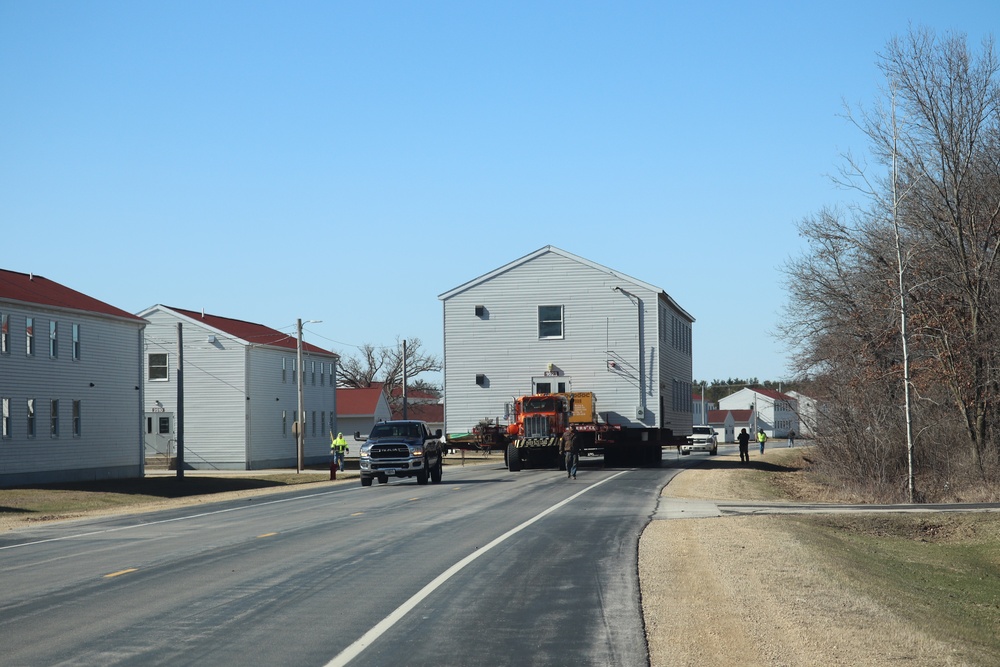 Contractors move fourth World War II-era barracks to new location in April 2023