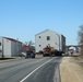 Contractors move fourth World War II-era barracks to new location in April 2023