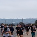 Service members and civilians participate in a SAPR Awareness 5K run