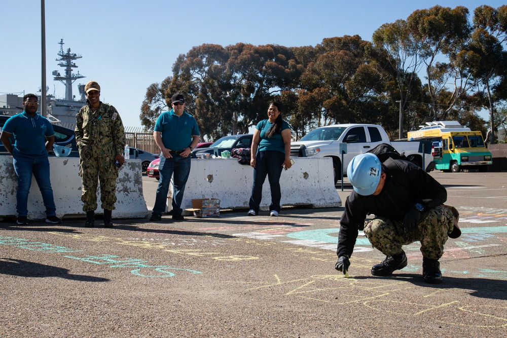 USS Abraham Lincoln SAPR VA team members promote sexual assault awareness