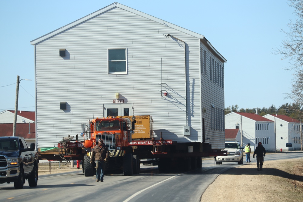 Contractors move fourth World War II-era barracks to new location in April 2023