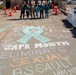 USS Abraham Lincoln SAPR VA team members promote sexual assault awareness