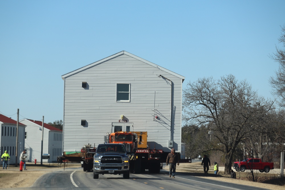 Contractors move fourth World War II-era barracks to new location in April 2023