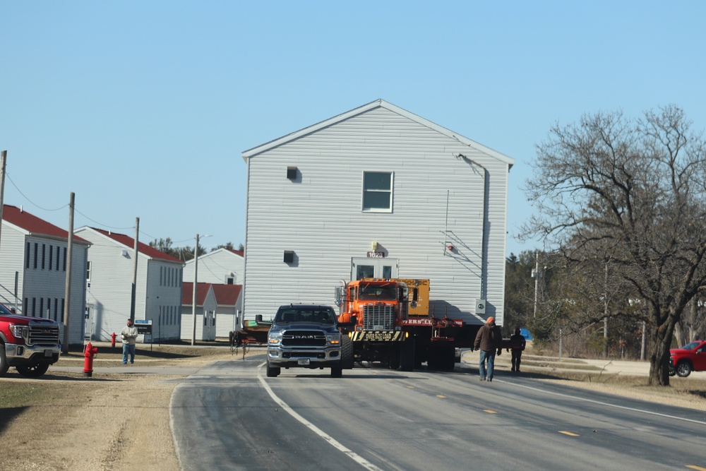 Contractors move fourth World War II-era barracks to new location in April 2023