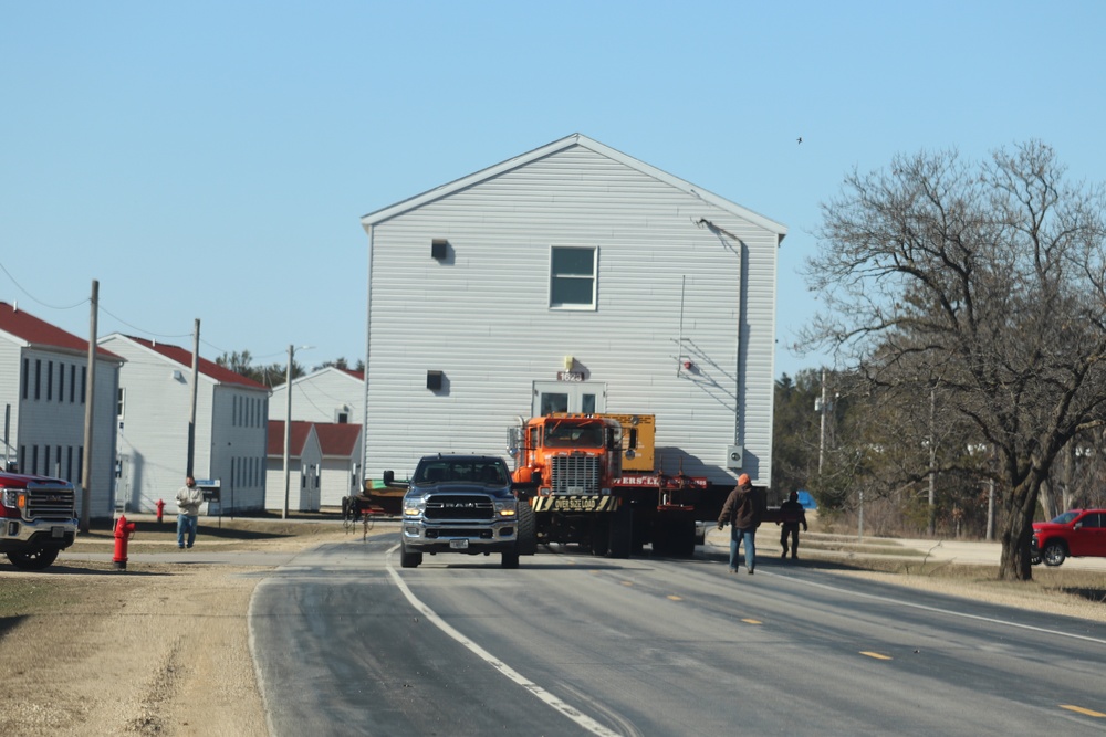 Contractors move fourth World War II-era barracks to new location in April 2023