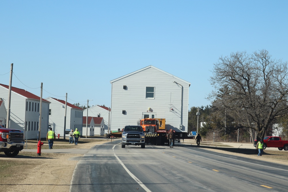 Contractors move fourth World War II-era barracks to new location in April 2023