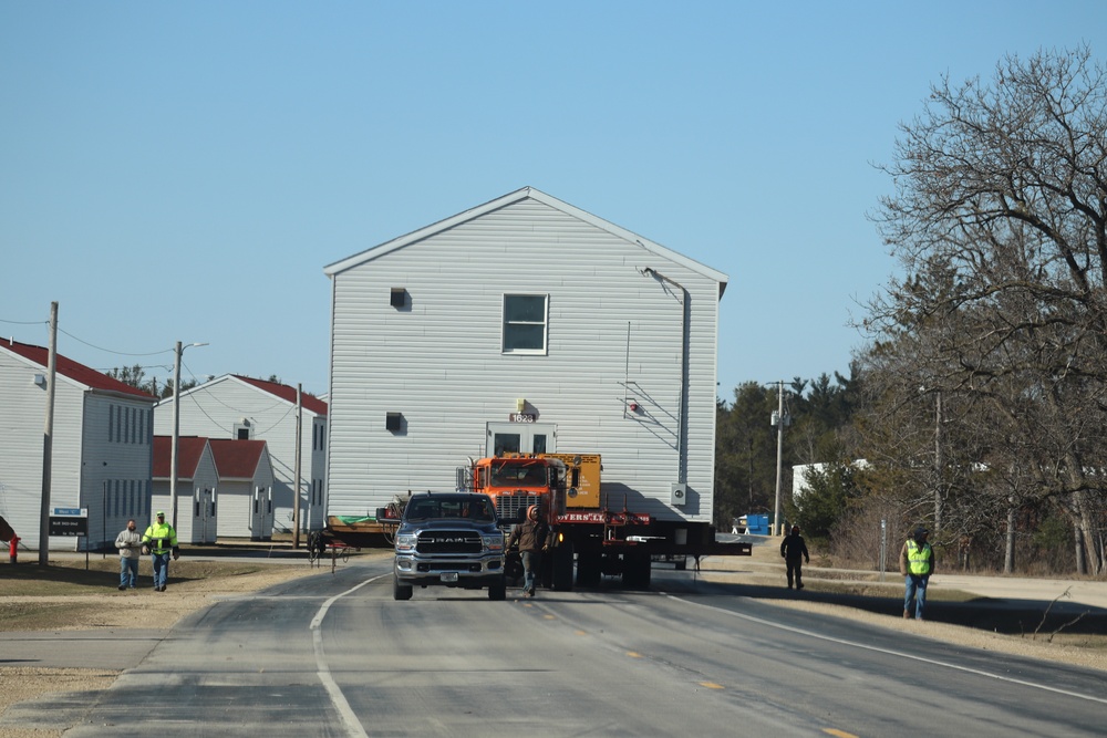 Contractors move fourth World War II-era barracks to new location in April 2023