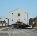 Contractors move fourth World War II-era barracks to new location in April 2023