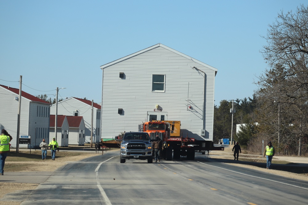 Contractors move fourth World War II-era barracks to new location in April 2023