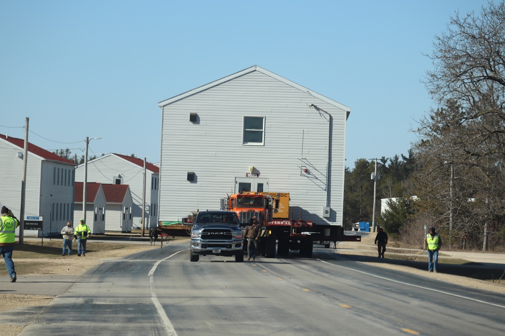 Contractors move fourth World War II-era barracks to new location in April 2023