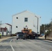 Contractors move fourth World War II-era barracks to new location in April 2023