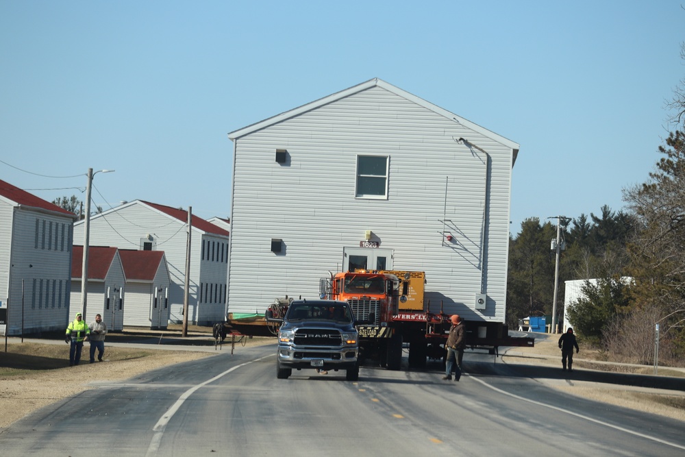 Contractors move fourth World War II-era barracks to new location in April 2023