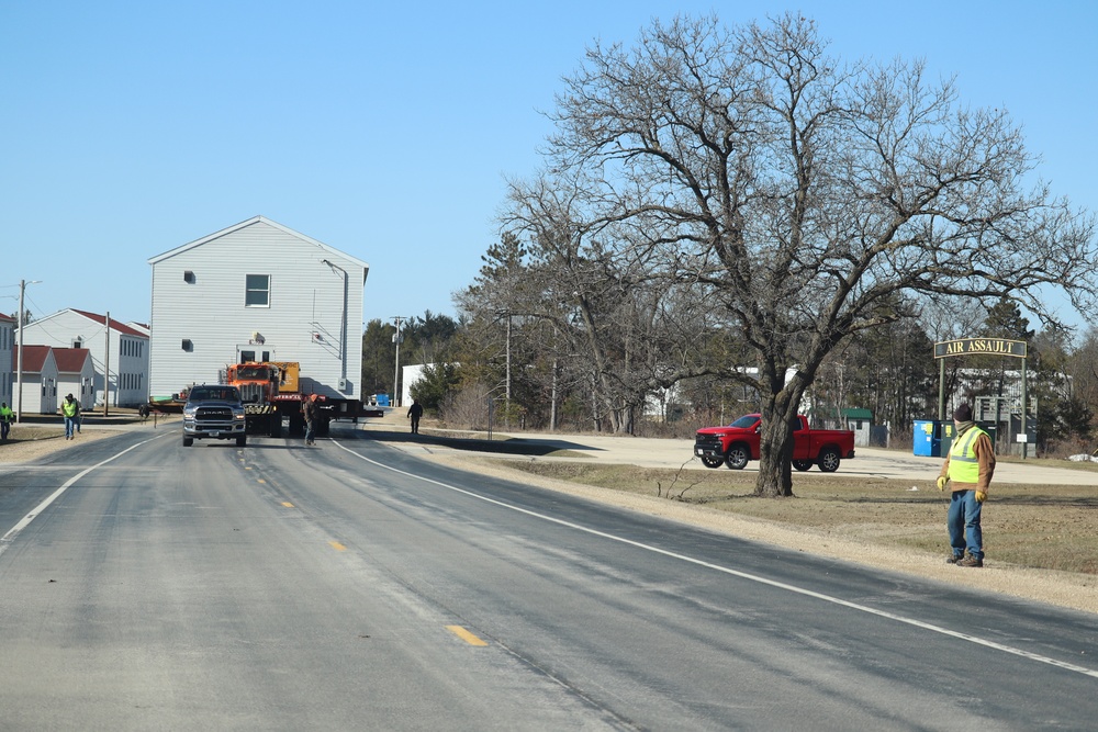 Contractors move fourth World War II-era barracks to new location in April 2023