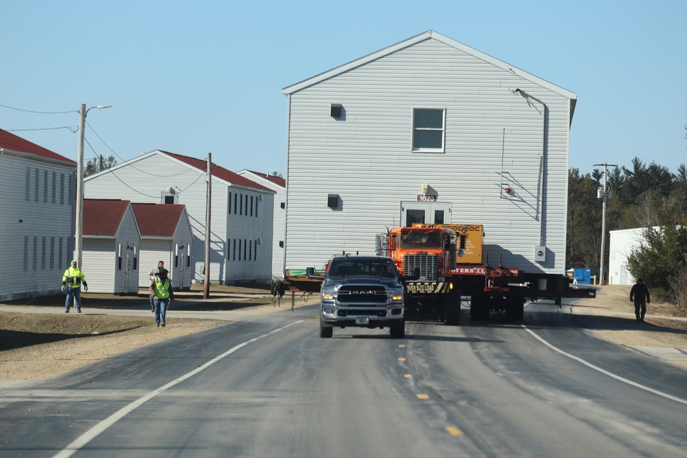 Contractors move fourth World War II-era barracks to new location in April 2023