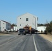 Contractors move fourth World War II-era barracks to new location in April 2023