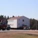 Contractors move fourth World War II-era barracks to new location in April 2023